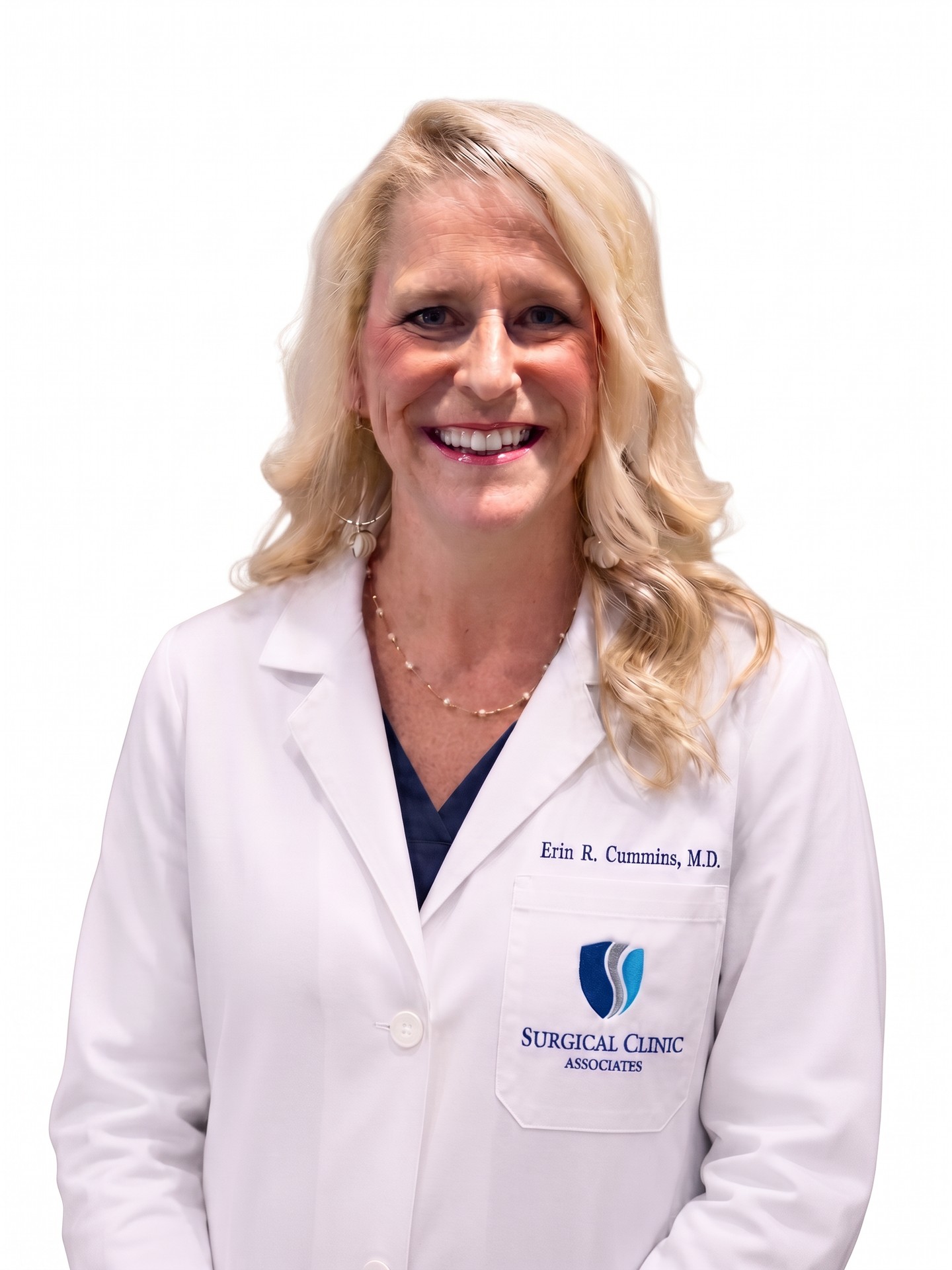Portrait of Erin R. Cummins, MD, FACS, in a white coat